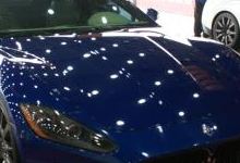 Automotive glass defogging method